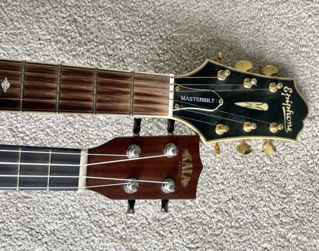 Ukulele and guitar strings, fretboards, and headstocks
