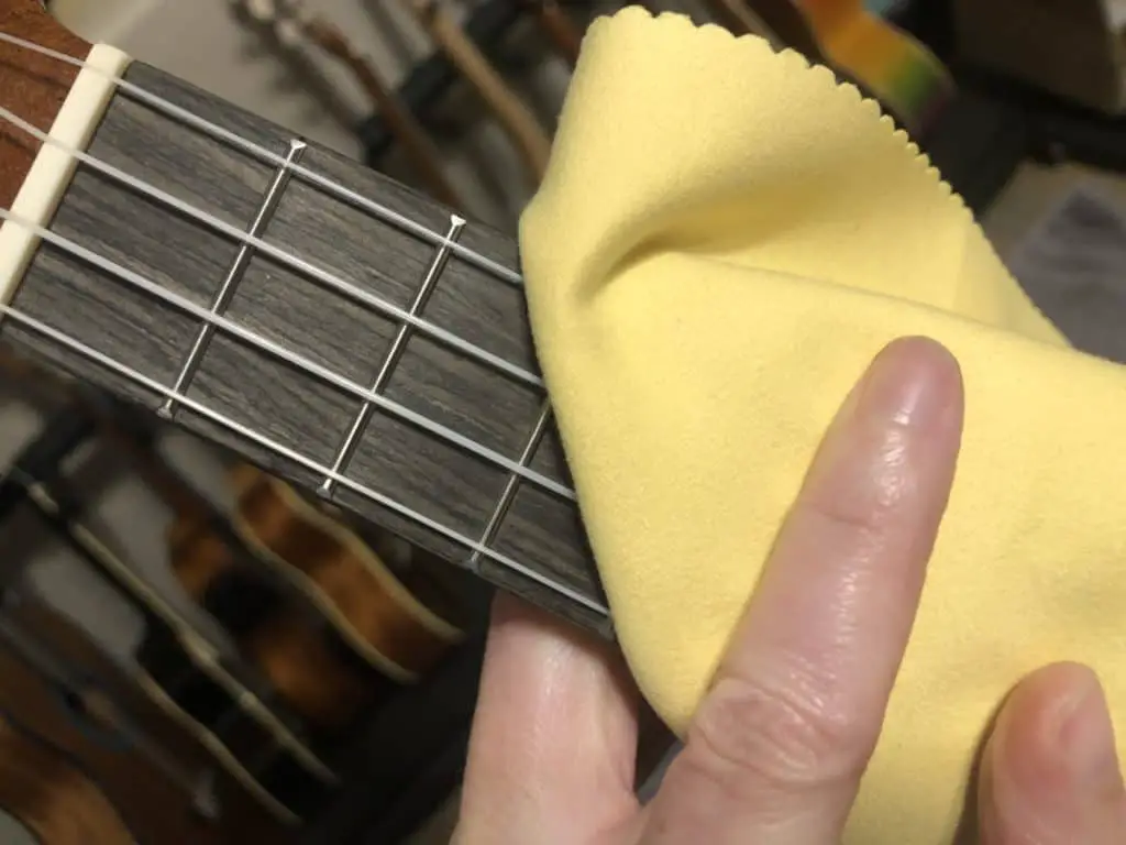 Wiping Strings with Microfiber Cloth